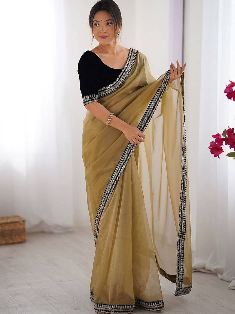 Brown solid embroidered net saree