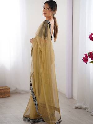 Brown solid embroidered net saree 2