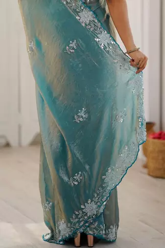 Turquoise floral embroidered satin designer saree