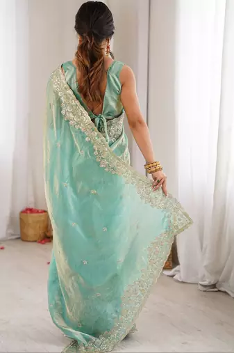 Turquoise embellished sequinned satin designer saree