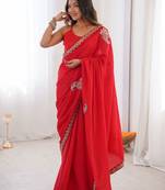 Red ethnic motifs embroidered silk blend heavy work saree