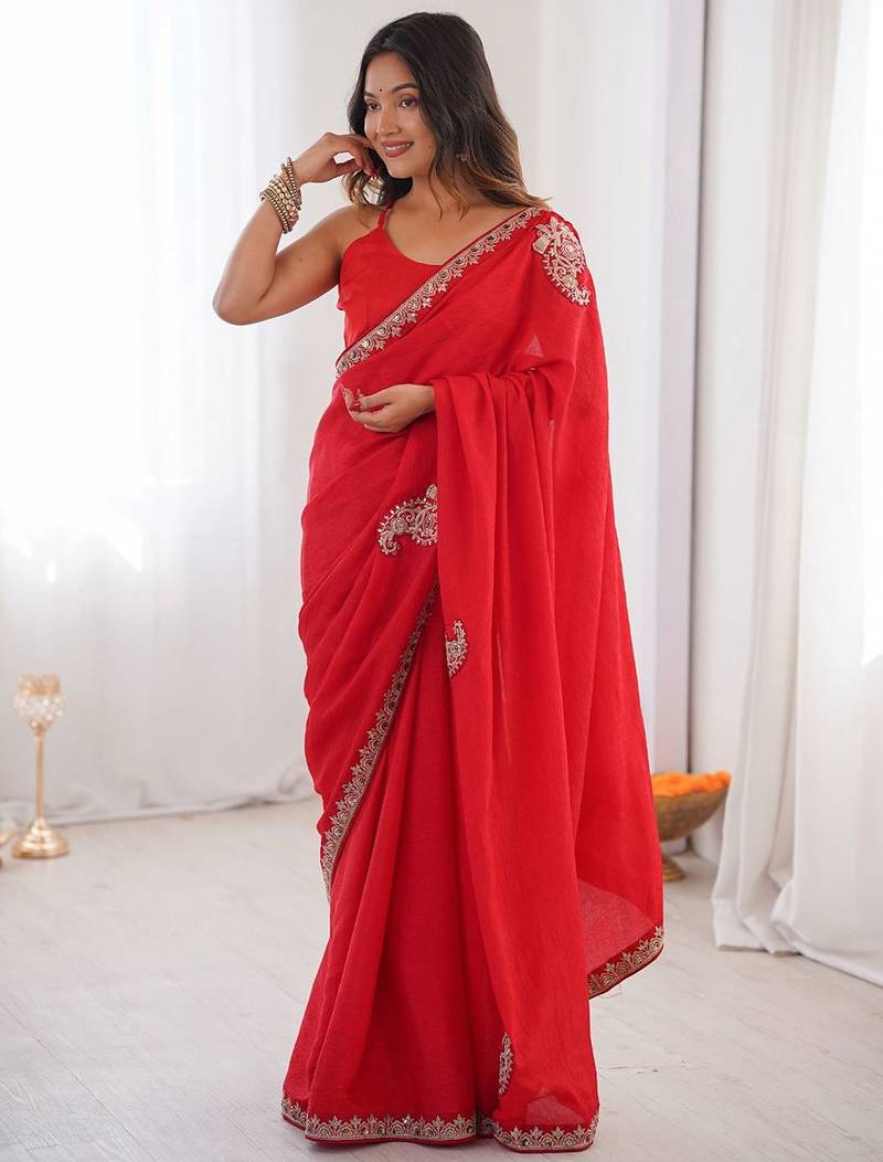 Red ethnic motifs embroidered silk blend heavy work saree