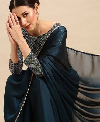 Teal sequinned  georgette saree 1