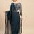 Teal sequinned  georgette saree