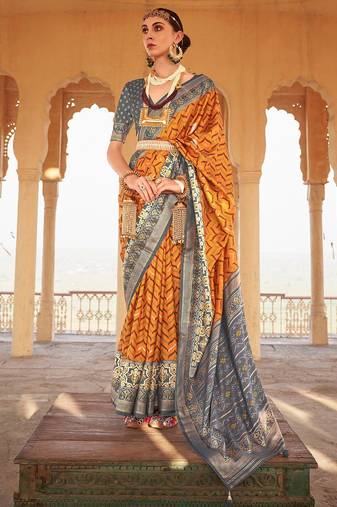 Mustard mustard & grey ethnic woven design zari patola saree