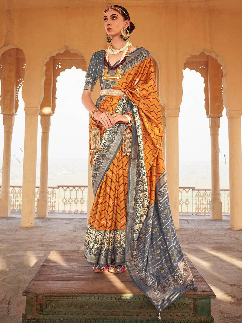 Mustard mustard & grey ethnic woven design zari patola saree