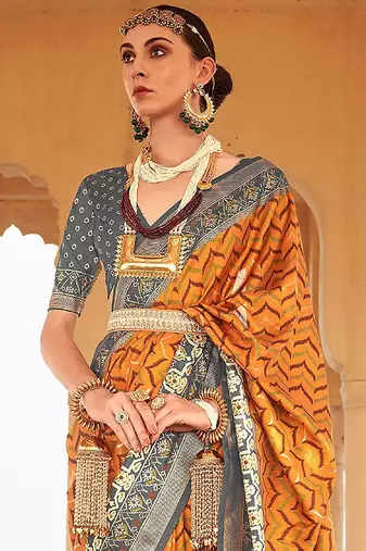 Mustard mustard & grey ethnic woven design zari patola saree