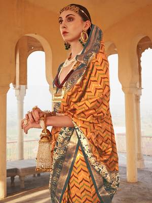 Mustard mustard & grey ethnic woven design zari patola saree 3