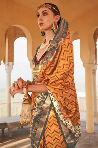 Mustard mustard & grey ethnic woven design zari patola saree