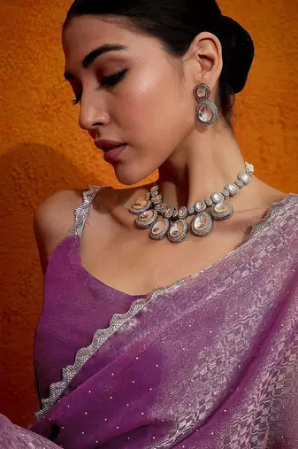 Mauve embellished beads and stones organza saree