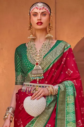 Red red & green ethnic motifs woven design zari saree