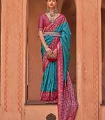 Blue ethnic motifs woven design zari silk blend banarasi saree