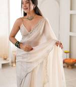 Off white embellished sequinned satin heavy work saree