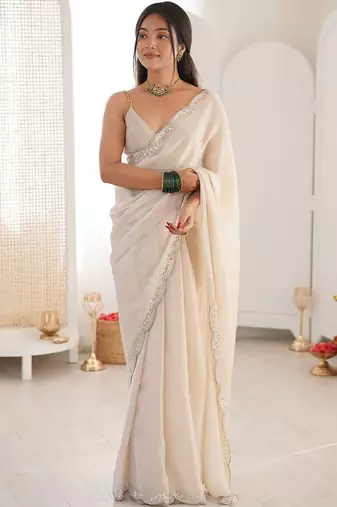 Off white embellished sequinned satin heavy work saree