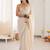 Off white embellished sequinned satin heavy work saree