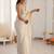 Off white embellished sequinned satin heavy work saree