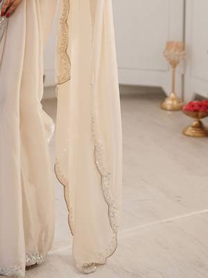Off white embellished sequinned satin heavy work saree 5