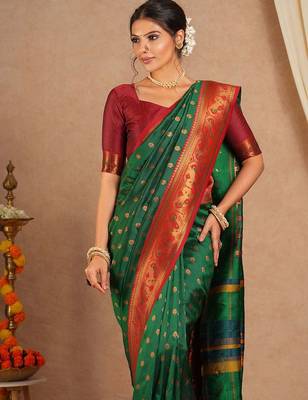 Green woven design zari silk blend paithani saree 1