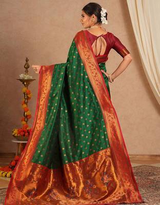 Green woven design zari silk blend paithani saree 4
