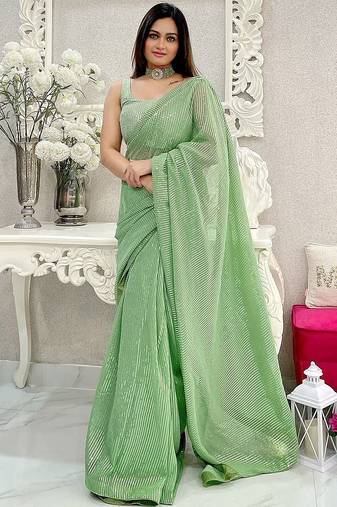 Green striped sequinned saree