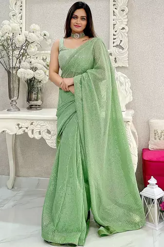 Green striped sequinned saree