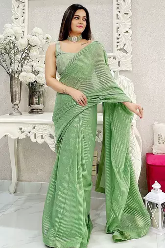 Green striped sequinned saree