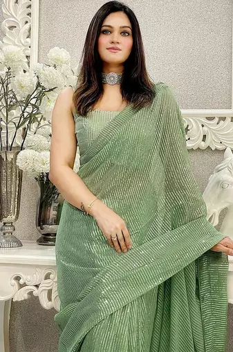 Green striped sequinned saree