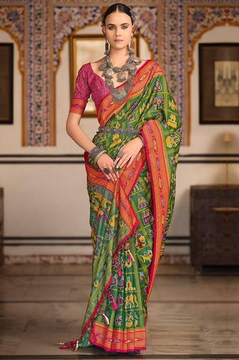 Green ethnic motifs printed zari patola celebrity saree