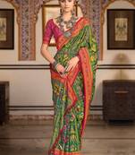 Green ethnic motifs printed zari patola celebrity saree