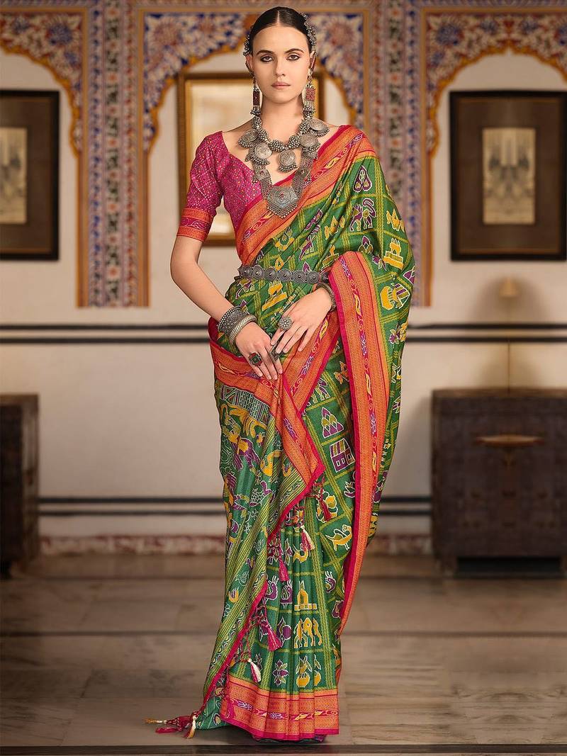 Green ethnic motifs printed zari patola celebrity saree