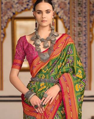 Green ethnic motifs printed zari patola celebrity saree 2