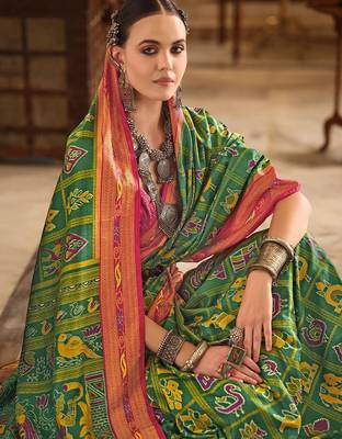 Green ethnic motifs printed zari patola celebrity saree 4