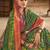 Green ethnic motifs printed zari patola celebrity saree