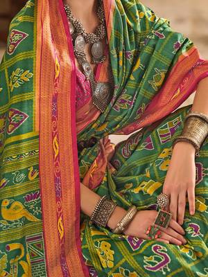 Green ethnic motifs printed zari patola celebrity saree 5