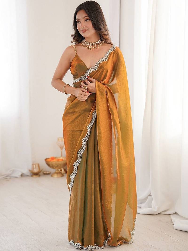 Gold embellished zari satin heavy work saree