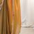 Gold embellished zari satin heavy work saree