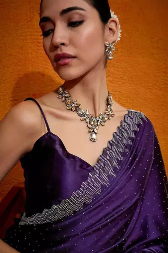 Purple embellished beads and stones satin saree
