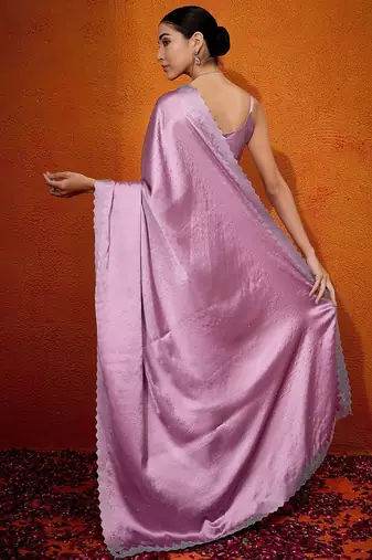 Mauve embellished beads and stones satin saree