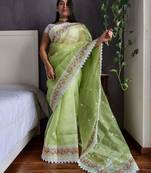 Green floral embroidered organza saree