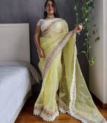 Yellow yellow & white floral embroidered organza saree