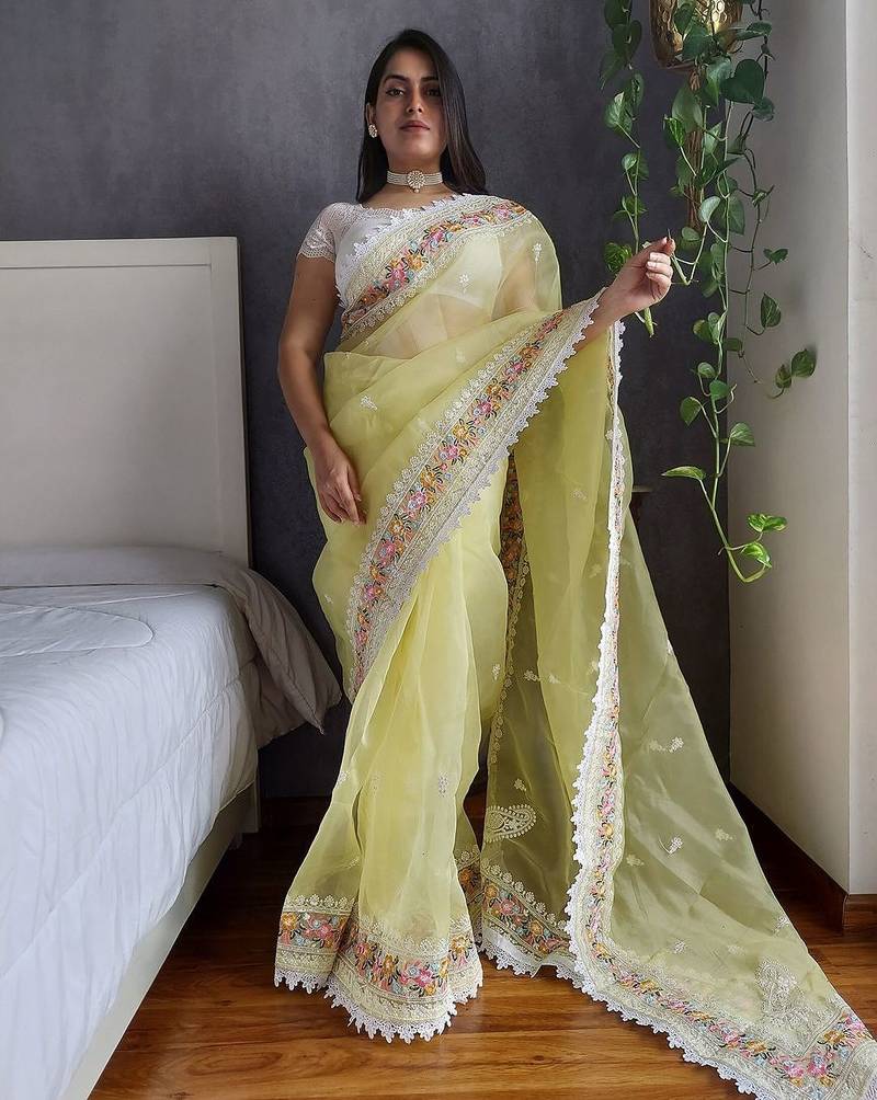 Yellow yellow & white floral embroidered organza saree