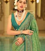 Green woven design zari kanjeevaram saree