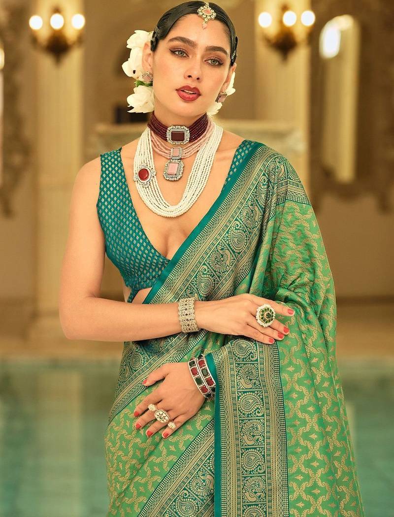 Green woven design zari kanjeevaram saree