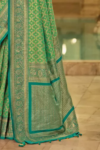 Green woven design zari kanjeevaram saree