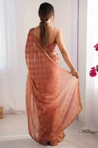 Rust embellished checked sequinned  chiffon saree