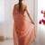 Rust embellished checked sequinned  chiffon saree