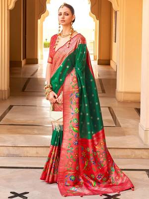 Green woven design zari silk blend designer banarasi saree 1