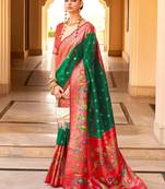 Green woven design zari silk blend designer banarasi saree