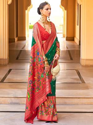 Green woven design zari silk blend designer banarasi saree 2