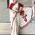 Off white ethnic motifs beads and stones block print saree